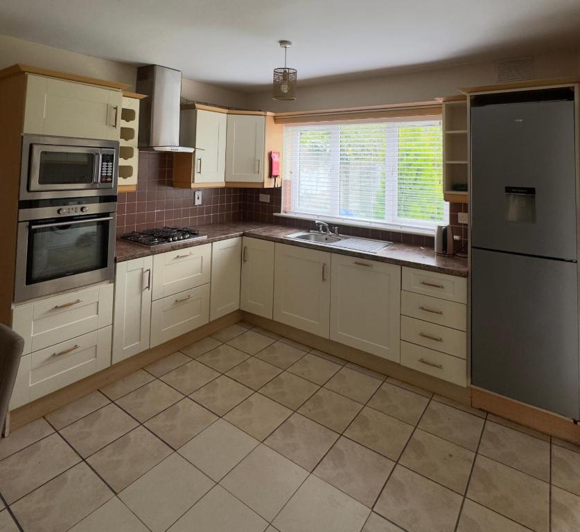 Kuchyň nebo kuchyňský kout v ubytování Serene Home