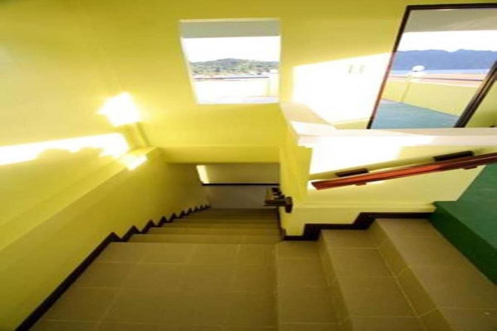 Posezení v ubytování Luis Bay Travellers Lodge Coron