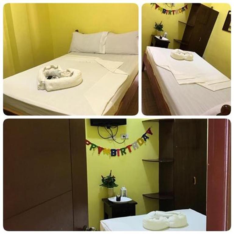 Postel nebo postele na pokoji v ubytování Luis Bay Travellers Lodge Coron