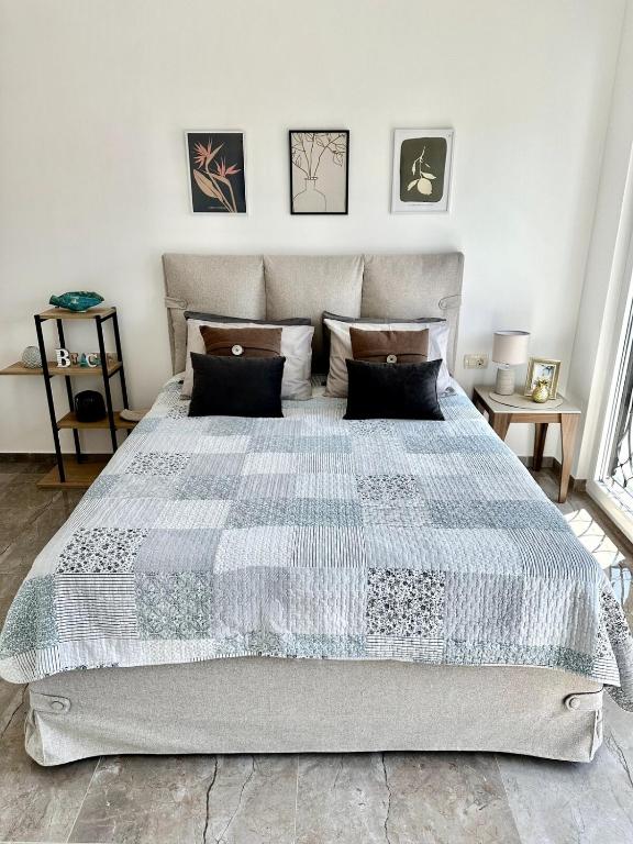 a bedroom with a large bed in a room at Casa M- Studio #1 - Brand New in Herceg-Novi