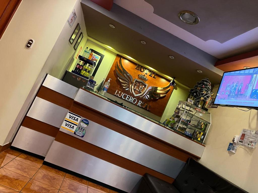 TV a/nebo společenská místnost v ubytování Hotel lucero real
