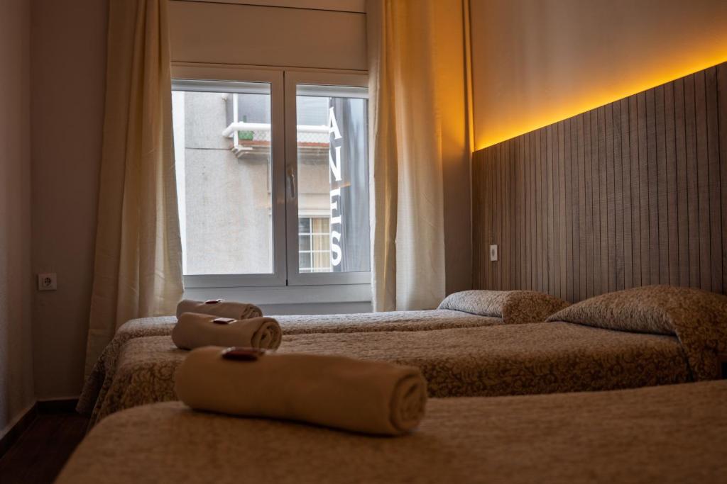 Postel nebo postele na pokoji v ubytování Can Setmanes by CozyCatalonia