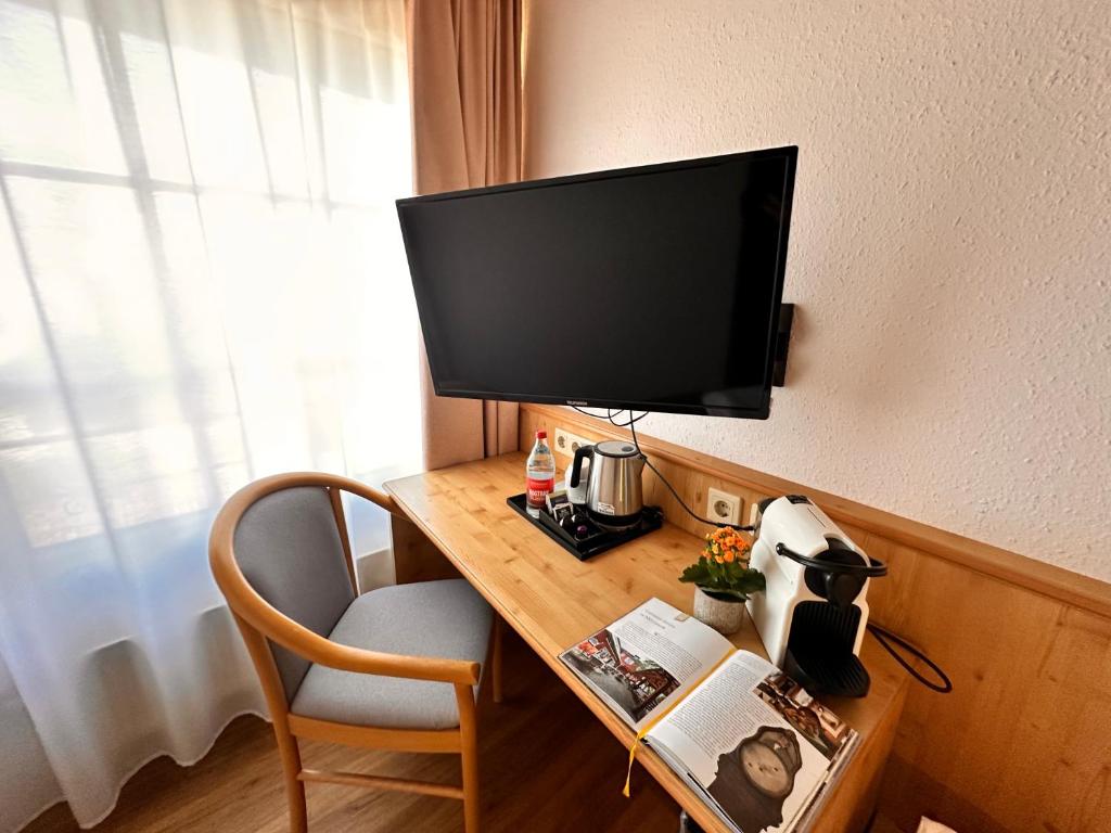 TV a/nebo společenská místnost v ubytování Gasthof Engel