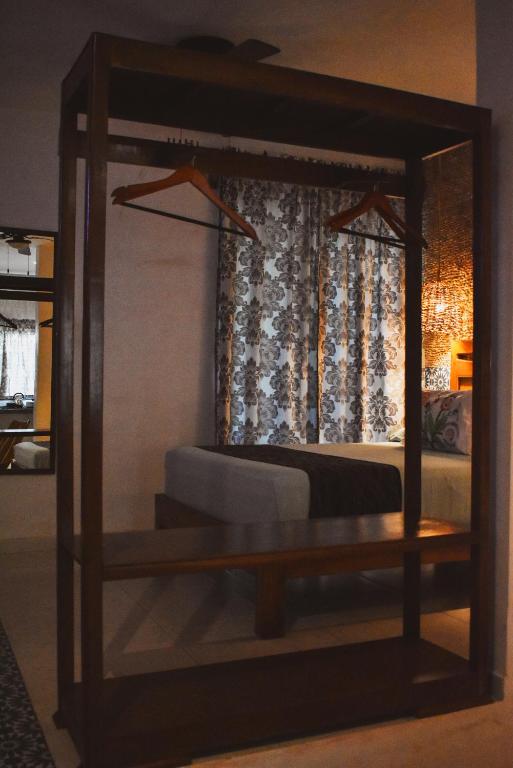 Postel nebo postele na pokoji v ubytování Hotel Boutique Bugambilias