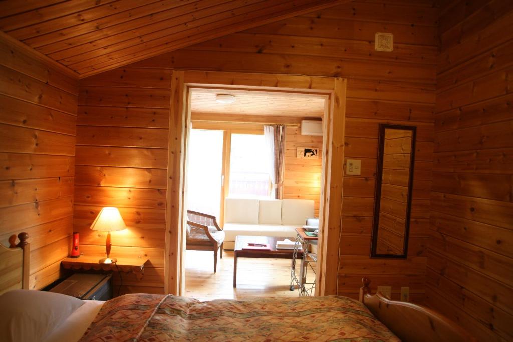 Postel nebo postele na pokoji v ubytování Hotel Andermatt