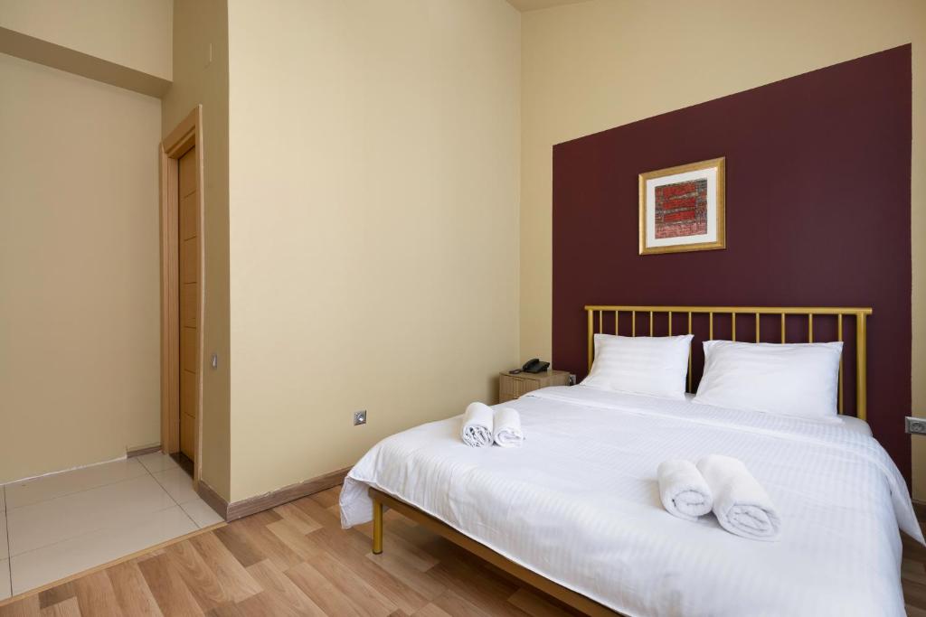 Postel nebo postele na pokoji v ubytování Acord Hotel & Balcony