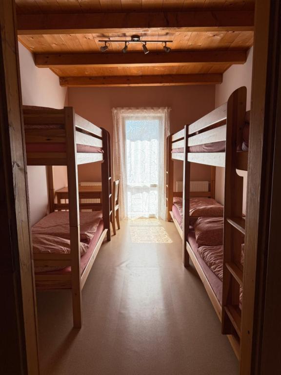 Postel nebo postele na pokoji v ubytování Ubytování Samba