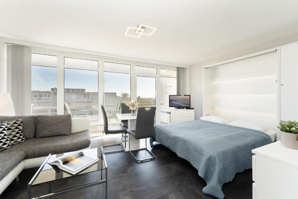 Postel nebo postele na pokoji v ubytování Baltic Wohnung 143