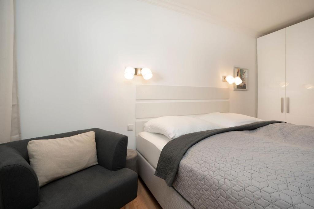 Postel nebo postele na pokoji v ubytování Miramar Wohnung 510