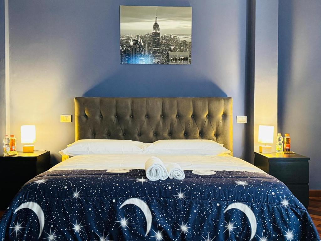 Postel nebo postele na pokoji v ubytování Nirvana House Pisa