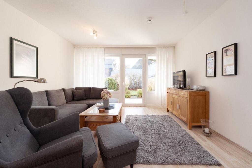 Posezení v ubytování Strandhotel Kellenhusen Wohnung 3