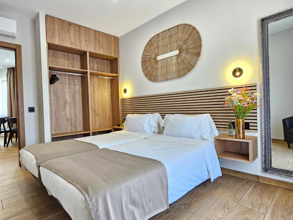 Postel nebo postele na pokoji v ubytování LAGOM Apartments NEW, 5 min walk from the sea