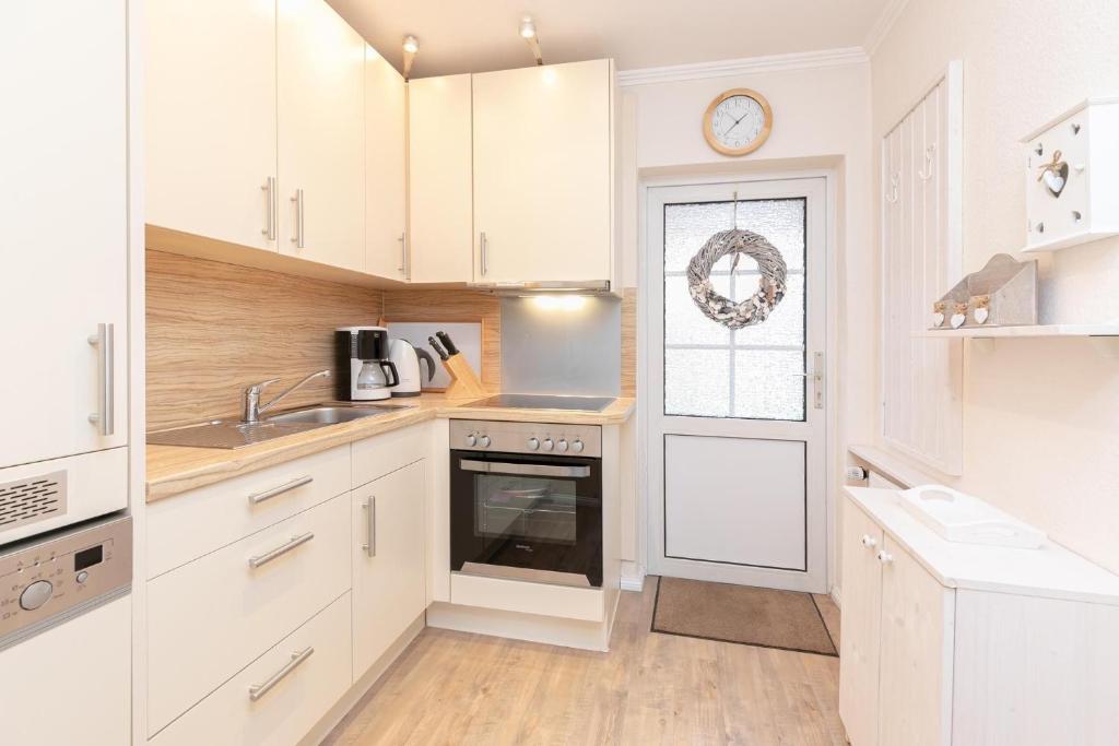 Kuchyň nebo kuchyňský kout v ubytování Rosenstraße 7 Eiland 2