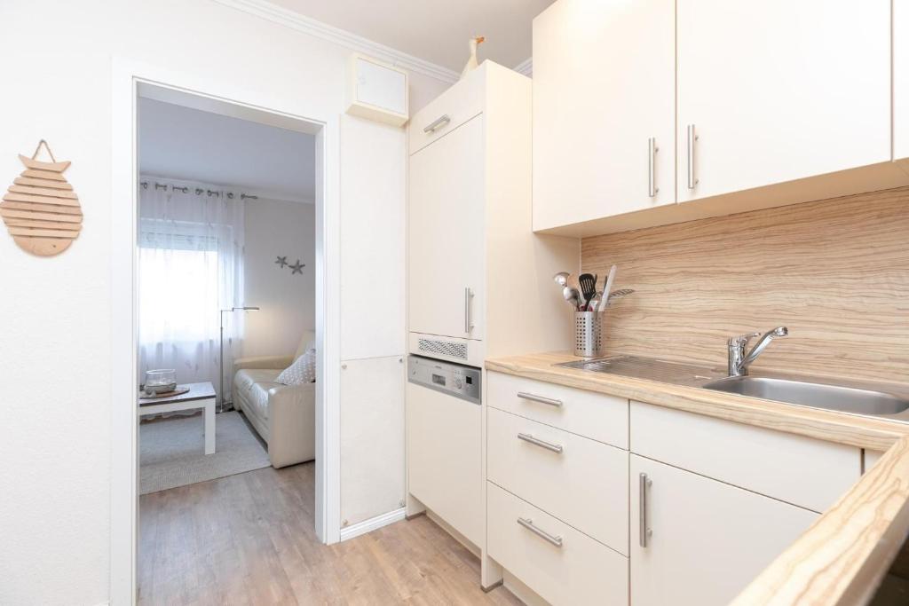 Kuchyň nebo kuchyňský kout v ubytování Rosenstraße 7 Eiland 2