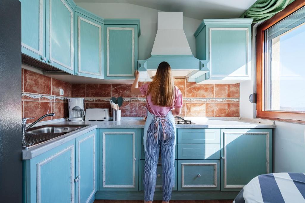 Kuchyň nebo kuchyňský kout v ubytování Apartments Radević