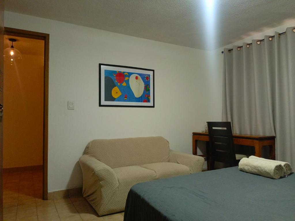 Postel nebo postele na pokoji v ubytování Casa Arena