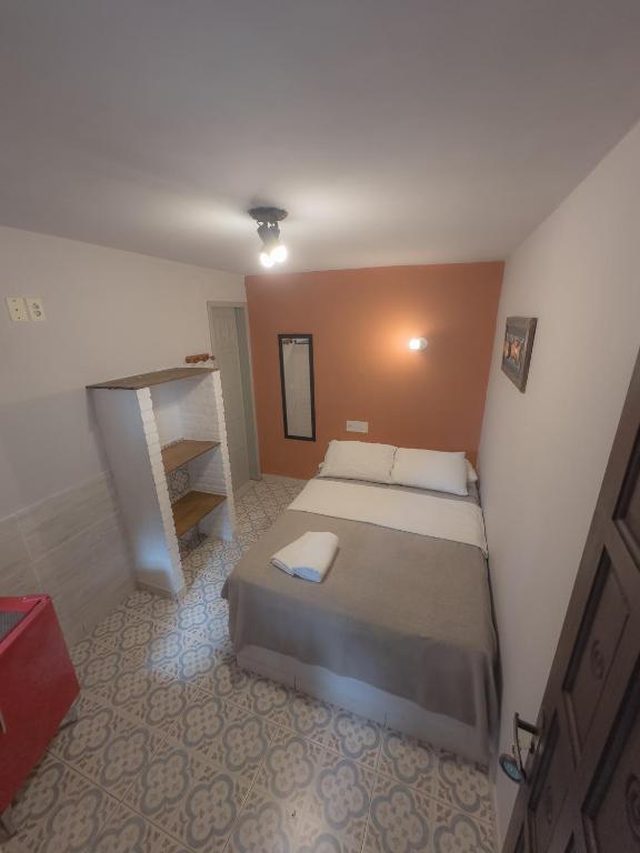 Postel nebo postele na pokoji v ubytování Biergarten Suites