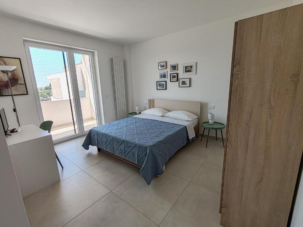 Postel nebo postele na pokoji v ubytování VersoSud Room