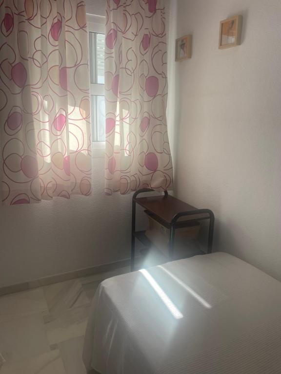 Posteľ alebo postele v izbe v ubytovaní Casa en el centro de Conil