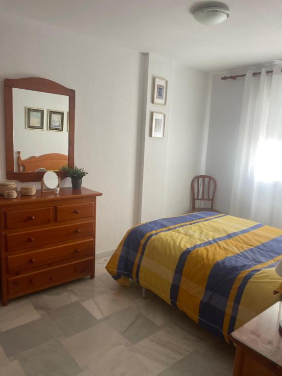 Posteľ alebo postele v izbe v ubytovaní Casa en el centro de Conil