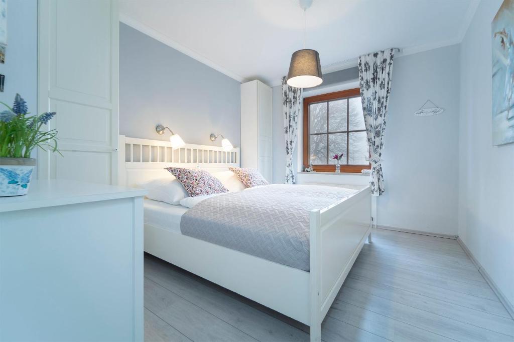 Postel nebo postele na pokoji v ubytování Seestraße 43 Wohnung 3