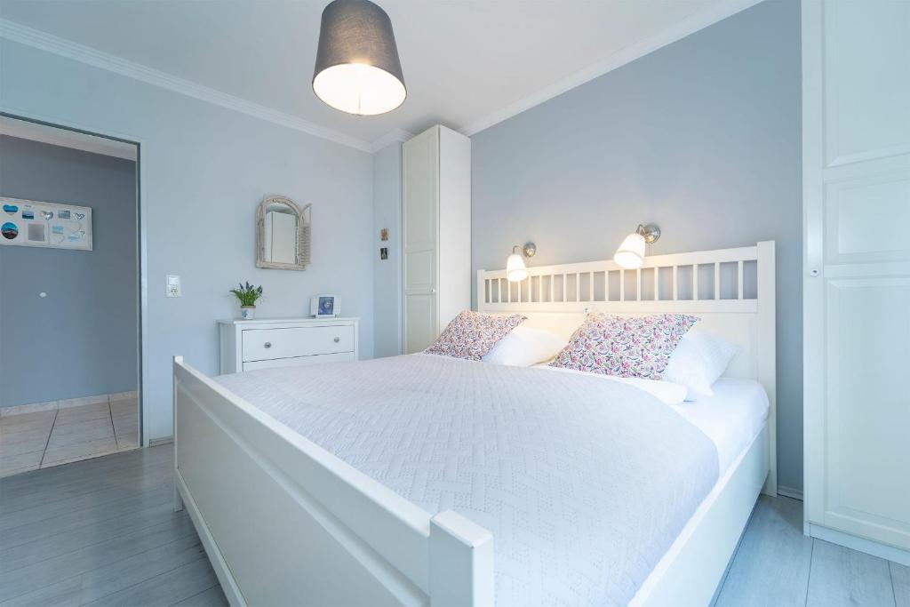 Postel nebo postele na pokoji v ubytování Seestraße 43 Wohnung 3