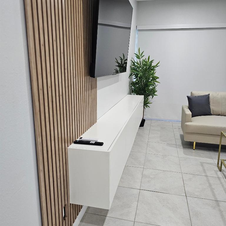 TV a/nebo společenská místnost v ubytování Simple Serenity