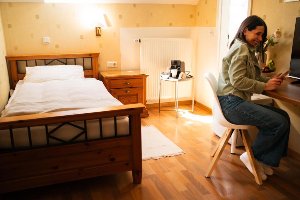 Postel nebo postele na pokoji v ubytování Gästehaus Kliebenstein