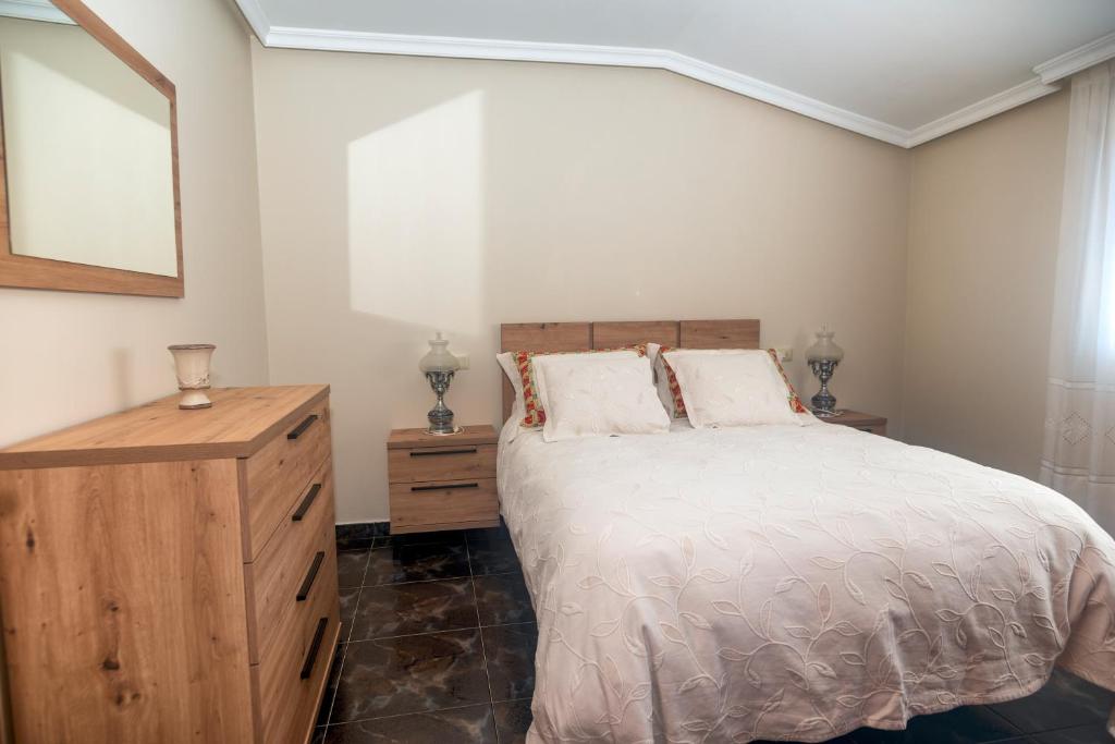 Postel nebo postele na pokoji v ubytování DUPLEX familias