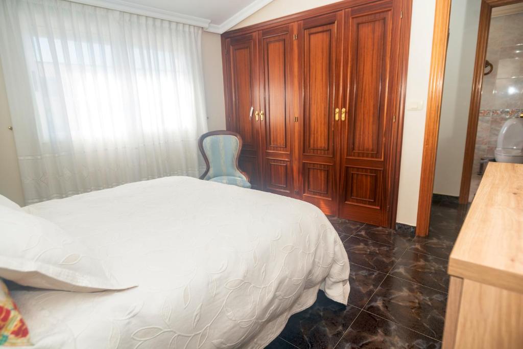 Postel nebo postele na pokoji v ubytování DUPLEX familias
