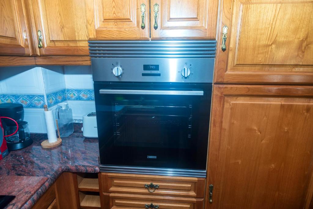 Kuchyň nebo kuchyňský kout v ubytování DUPLEX familias