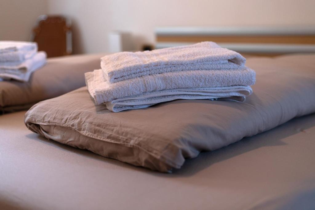 Postel nebo postele na pokoji v ubytování Bergreen Apartments