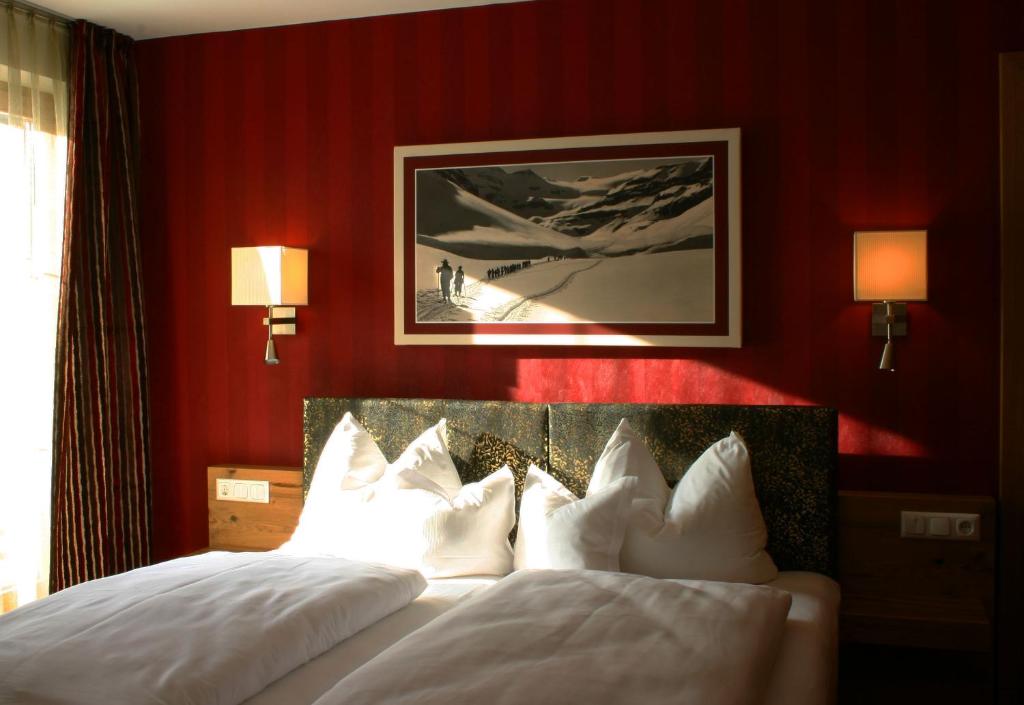 Postel nebo postele na pokoji v ubytování Hotel Rettenberg