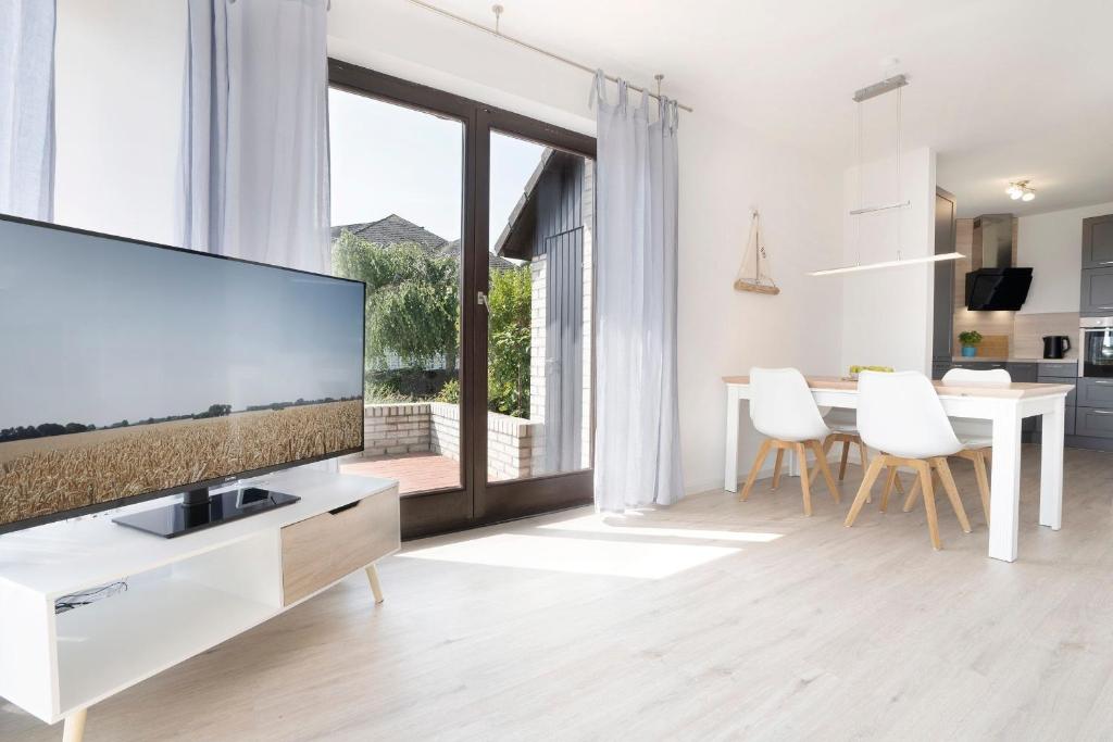 TV a/nebo společenská místnost v ubytování Haus Humml