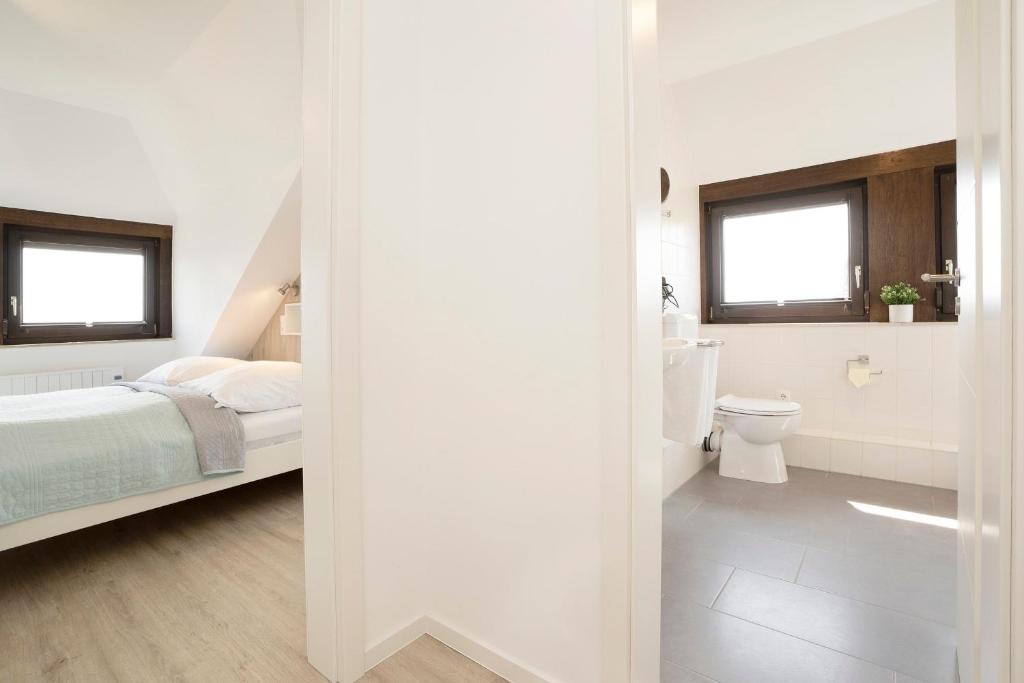 Postel nebo postele na pokoji v ubytování Haus Humml
