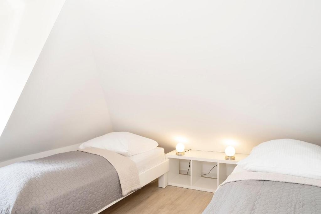 Postel nebo postele na pokoji v ubytování Haus Humml