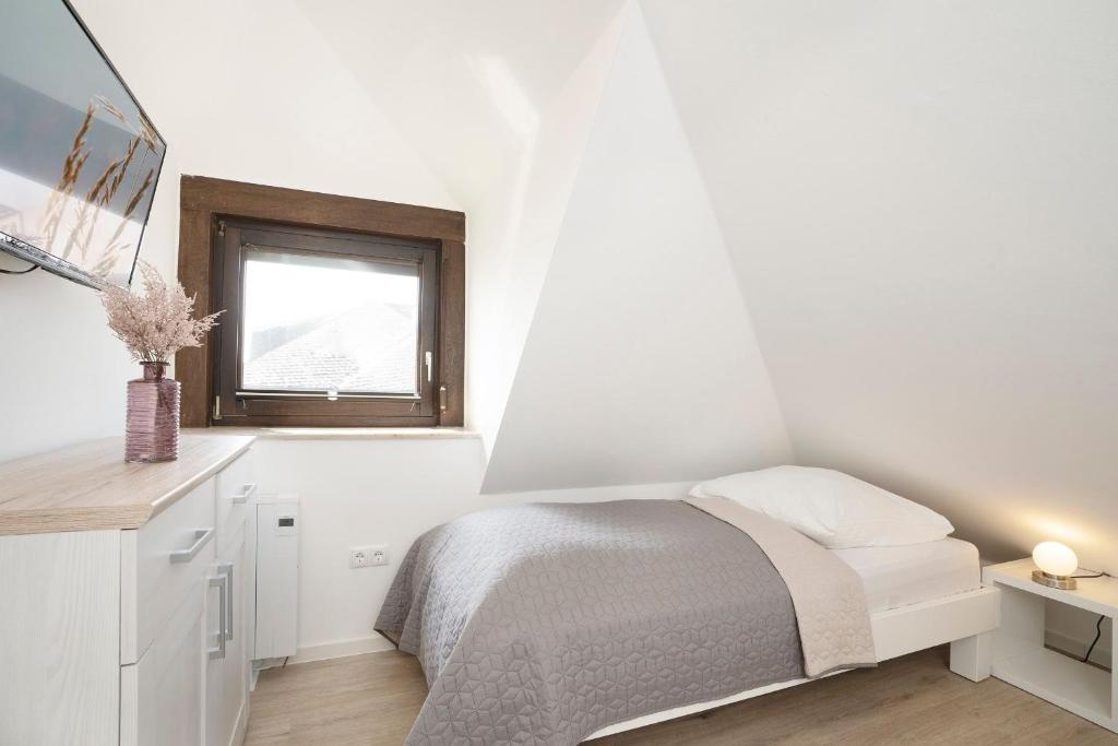 Postel nebo postele na pokoji v ubytování Haus Humml