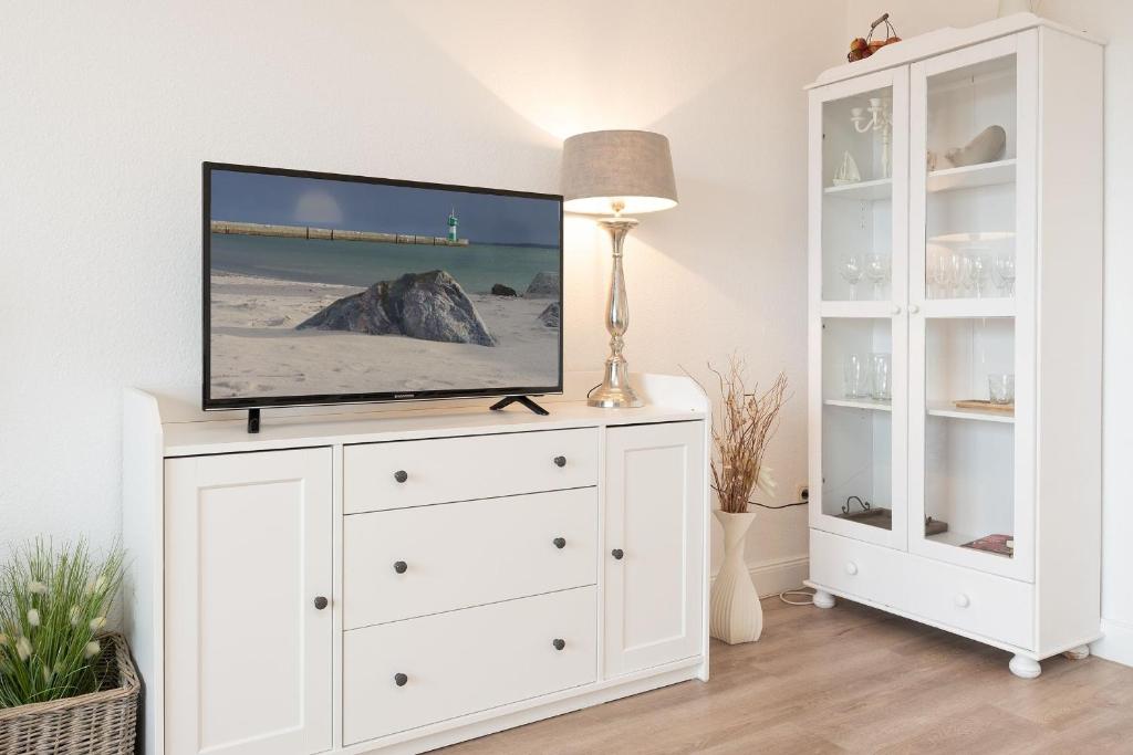 TV a/nebo společenská místnost v ubytování Haus Hasenkamp 26 Hasenbau