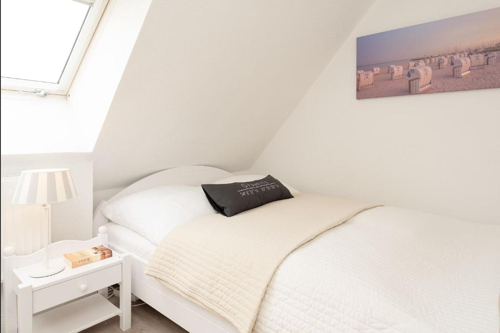 Postel nebo postele na pokoji v ubytování Haus Hasenkamp 26 Hasenbau