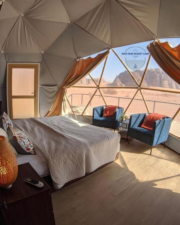 Postel nebo postele na pokoji v ubytování WADl RUM DESERT CAMP