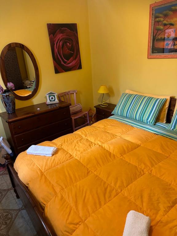 Posteľ alebo postele v izbe v ubytovaní Cottage Gole Alcantara Pafumi