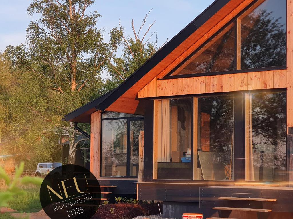 WerderChalet -- MEER IN SICHT -- Meerblick I Strand 150m I Sauna I eKamin I bis 5 Pers I by "Meyers am Meer"
