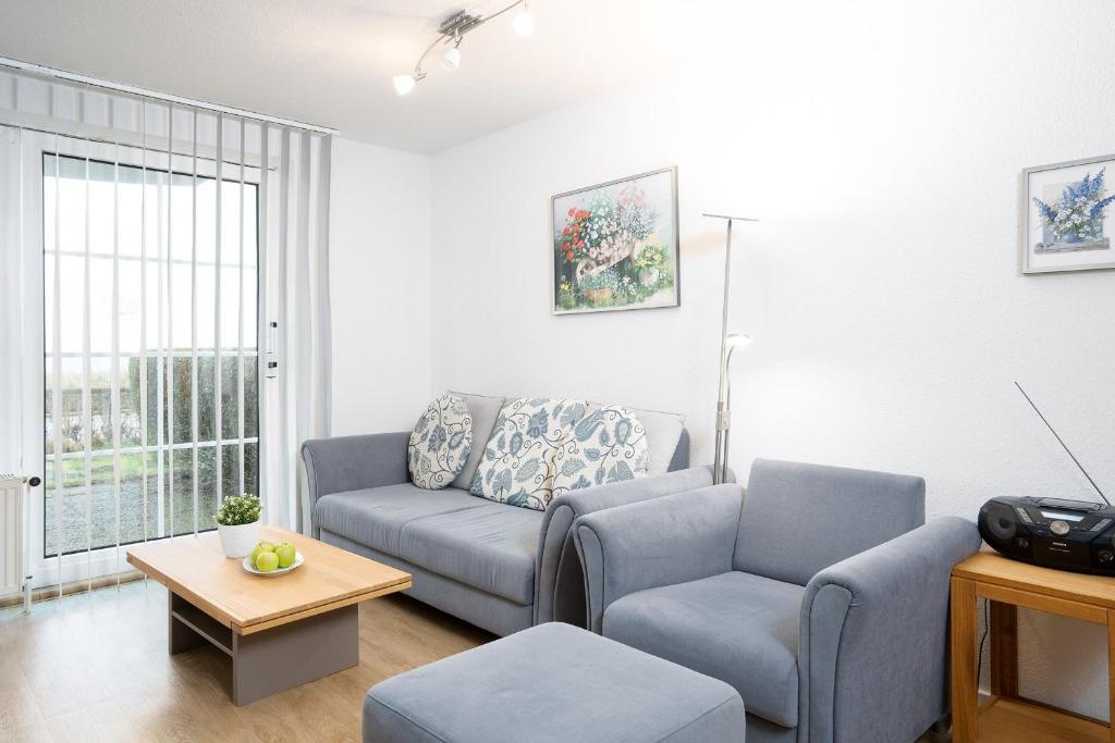 Posezení v ubytování Strandresidenz Wohnung 1