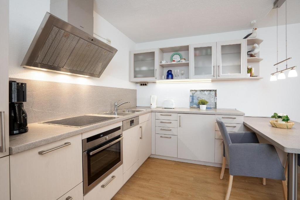 Kuchyň nebo kuchyňský kout v ubytování Strandresidenz Wohnung 1