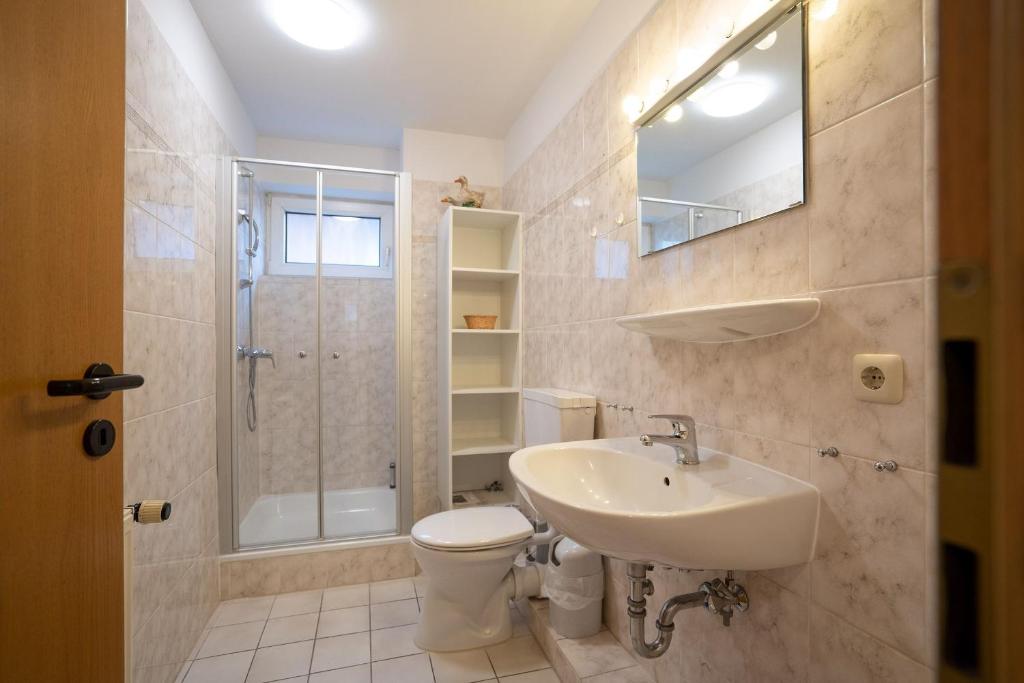 Koupelna v ubytování Strandresidenz Wohnung 1