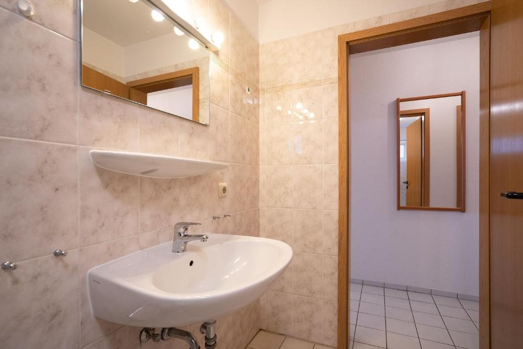 Koupelna v ubytování Strandresidenz Wohnung 1