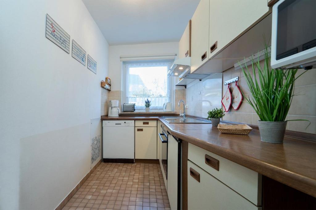 Kuchyň nebo kuchyňský kout v ubytování Fischerstraße 10a Zum Möwennest