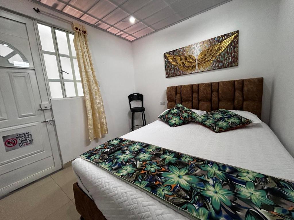 Postel nebo postele na pokoji v ubytování Habitación con baño privado 2