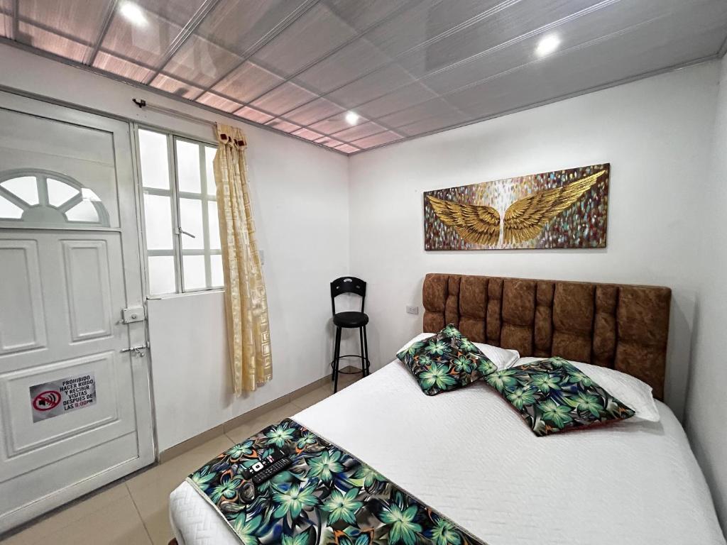Postel nebo postele na pokoji v ubytování Habitación con baño privado 2
