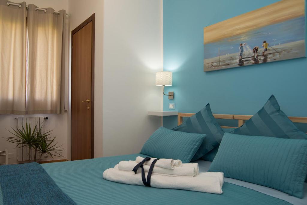 Postel nebo postele na pokoji v ubytování Bed & breakfast Giulio